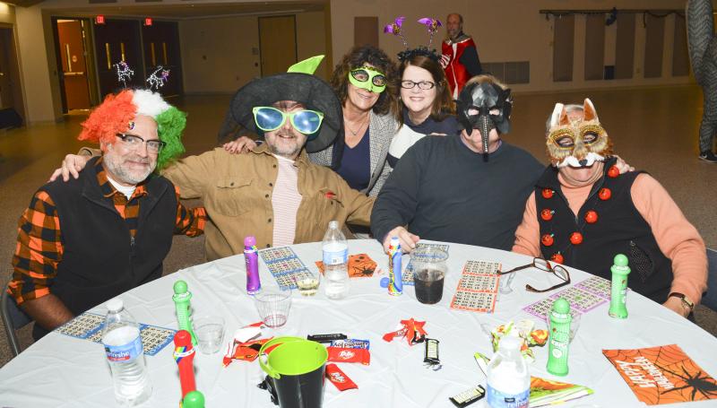 Getting ready to play bingo (l-r) are James Slusher, Thomas Morris, Emilie Paternoster, Monica Parr, Carl Preate and Gene Pantano.